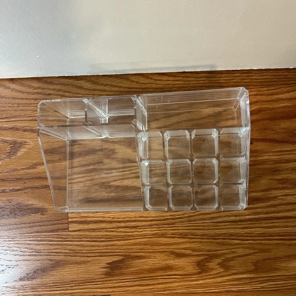 Clear acrylic makeup tray with 15 compartments